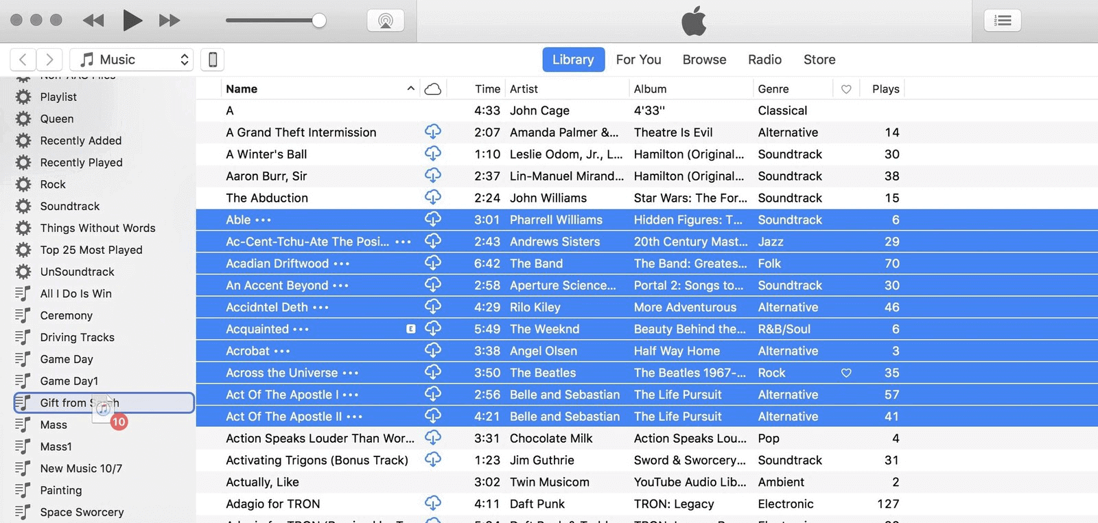 اسحب الأغاني لضبطها في قائمة تشغيل itunes