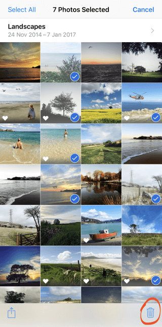 حدد الصور المراد حذفها من ألبوم iPhone